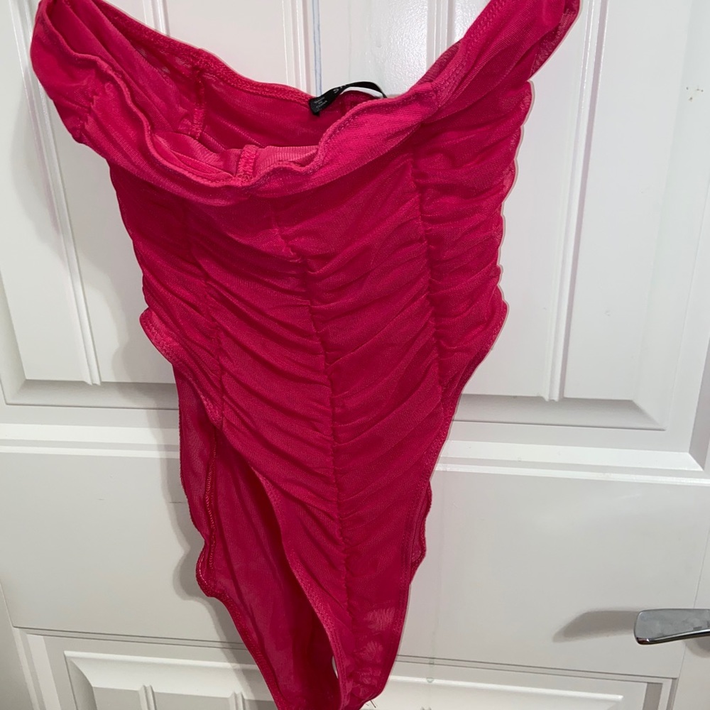 Pink body suit